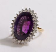 18 carat gold amethyst and diamond set ring, the large amethyst at approximately 15 carats and a