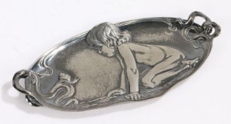 WMF pewter oval dressing table tray, decorated with a young child looking at a snail, flanked by