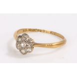 18 carat gold diamond set ring, the diamond set head in the form of a flower, 1.6 grams, ring size