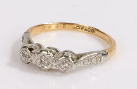 18 carat gold and diamond set ring, with three diamonds to the head, 2.3 grams, ring size J