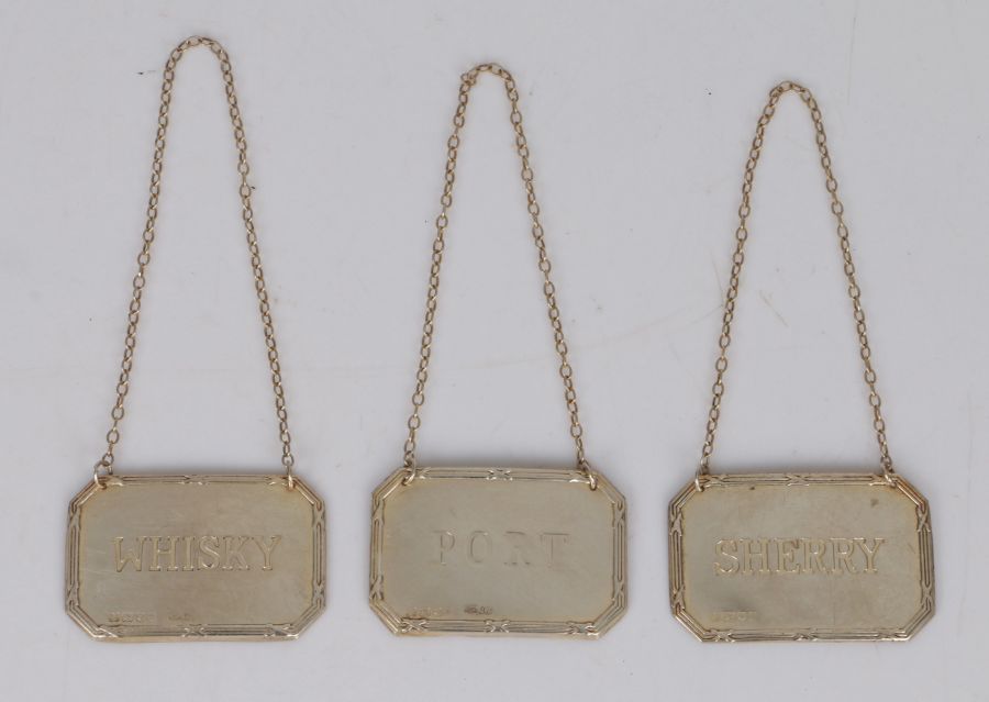 Three Elizabeth II silver decanter labels, London 1987/88, maker Kitney & Co (Gordon & Christopher
