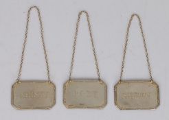 Three Elizabeth II silver decanter labels, London 1987/88, maker Kitney & Co (Gordon & Christopher