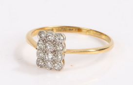 18 carat diamond set cluster ring, the rectangular head set with twelve round cut diamonds, 2.5