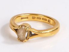 22 carat gold ring, set with a single oval smoky stone (stone chipped), 10.5 grams, ring size T