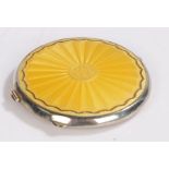 White metal and yellow enamel decorated powder compact, maker Joseph Gloster Ltd. of circular form