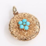 Victorian yellow metal and turquoise set pendant, with a flower head set with turquoise stones above