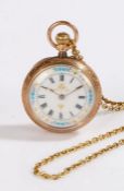 Ladies 14 carat gold open face pocket watch, the white enamel dial with Roman numerals, outer