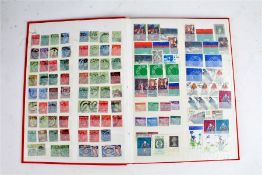 World stamps in two stock books including GB QU etc. (2)