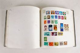 Mixed world stamps, New Zealand, Egypt, Germany, Turkey, USA, Canada etc., in one album