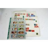 Assorted world stamps, box of album pages, packets etc.