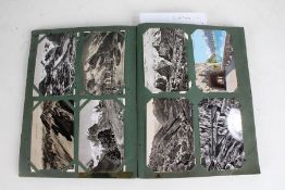 Postcards, mainly topographical, in four albums (4)