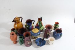 Extensive collection of Torquay pottery ware, to include vases, bowls, Dartmouth fishes, pair of