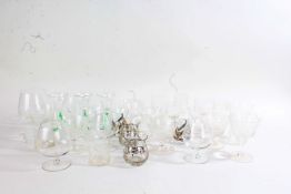 Collection of glassware, various styles and sizes, including cut glass examples, candlelight holders