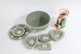 Seven items of Wedgwood green jasperware, to include a bowl, small box and cover, plate and four pin