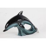Poole pottery leaping dolphin. 27cm wide