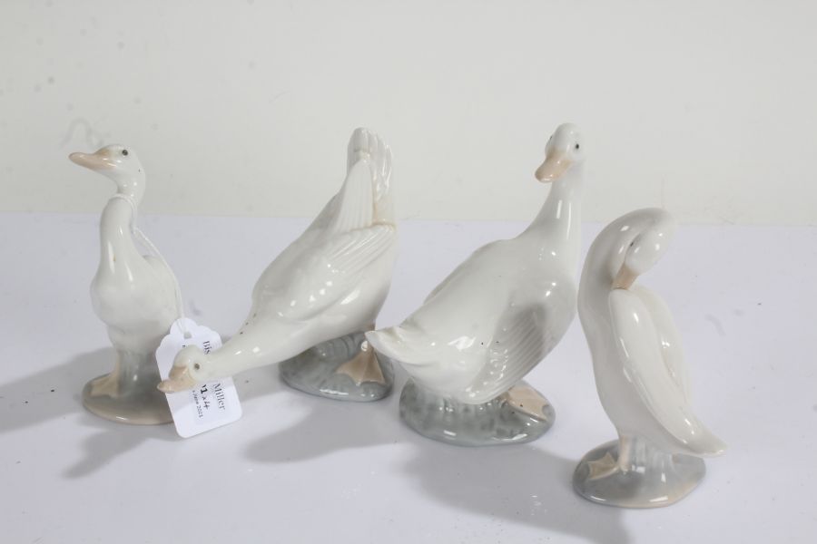 Two Lladro geese and two Nao geese, all modelled in various positions (4)