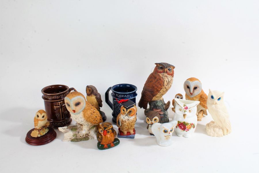 Collection of ceramic owls, some with stands, including two tankards (qty)