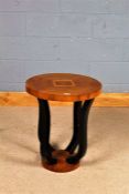 Art Deco style side table, having circular inlaid top raised on four ebonised shaped legs and