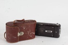 Kodak Tourist camera, with an Anastar f/4.5 101mm lens, together with a Soho Cadet bakelite