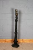 Cast metal post, mounted with a horses head and loop, 133cm tall