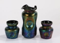 Trio of Art Nouveau iridescent glass vases, possibly Loetz, the larger vase with a folded lip