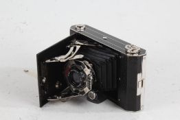 Kodak Six-20 folding camera, with a No. 0 Anastigmat f/6.3 100mm lens, housed in original box