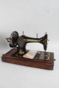 Three hand sewing machines, to include a Singer, Excella and Jones, all in carrying cases (3)