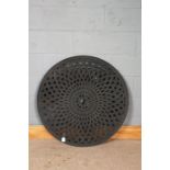 Large cast metal lazy susan, with latticed top, 92cm diameter