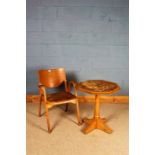 Octagonal top occasional table, on a turned stem and quadruple legs, 60cm diameter, bentwood elbow