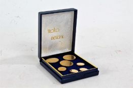 Troika Designs gold plated seven piece stud set, in original box