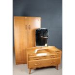 G-Plan light oak bedroom suite comprising a double wardrobe, 92cm wide x 175cm high, together with a