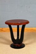 Art Deco style side table, having walnut effect circular top raised on ebonised shaped legs and