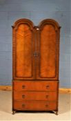 Butilux "Beauty Craftsmanship" mid 20th Century double dome top wardrobe, the arched doors opening