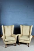Pair of Art Deco style wing back armchairs, 103cm high (2)