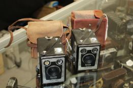 Two Kodak Brownie Six-20 Model D, cased (2)