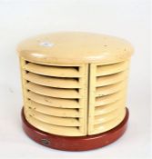 HMV Art Deco heater, of part rounded vented form, centred with a light bulb - sold as collectors