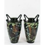 Two Lauder Barum pottery twin handled vases, the tapering bodies with bird and fish decoration, 29.