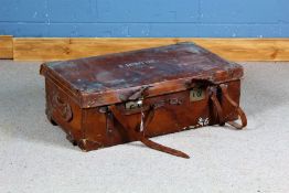 Early 20th century brown leather travelling trunk, the hinged lid enclosing a lift out tray, named