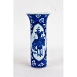 Chinese porcelain blue and white vase, with flared neck, the cylindrical body depicting a still life