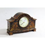 Chinoiserie mantel clock, the lacquered arched case with depictions of figures in a landscape, the