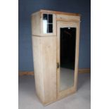 Victorian pine wardrobe, with simulated lead glazed window to the pediment, single mirrored door