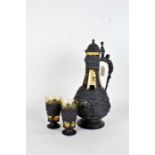 Continental style pewter and coloured glass claret jug, with hinged lid, female figural handle and