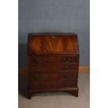 George III style mahogany bureau, the sloping drop front enclosing a fitted interior with a series