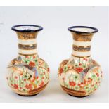 Pair of Japanese satsuma ware crackle glazed vases, with raised bird and foliate decoration, 19cm