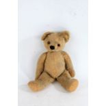 Mohair teddy bear, with glass eyes and adjustable arms and legs, 42cm long