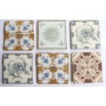 Six Victorian tiles, all with a transfer printed floral design (AF)