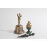 Tibetan brass hand bell, 15cm tall, together with a small ritual dagger and a metal lotus (3)