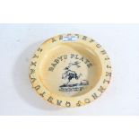 Early 20th century English pottery baby's plate, with the alphabet to the outer edge and 'Tom Tom