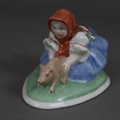 Porzellanfigur "Mädchen mit Glücksschwein" - Herend, Ungarn, um 1940, Porzellan, polychrom bemalt,