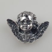Massive Silberbrosche in Gestalt eines geflügelten Puttokopfes - Sterling Silber, gepunzt, ca. 3x3,
